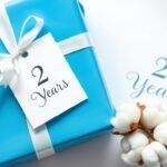A beautifully wrapped cotton anniversary gift with a card marked '2 years'