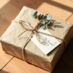 A beautifully wrapped thoughtful gift with a handwritten note and small personal touches