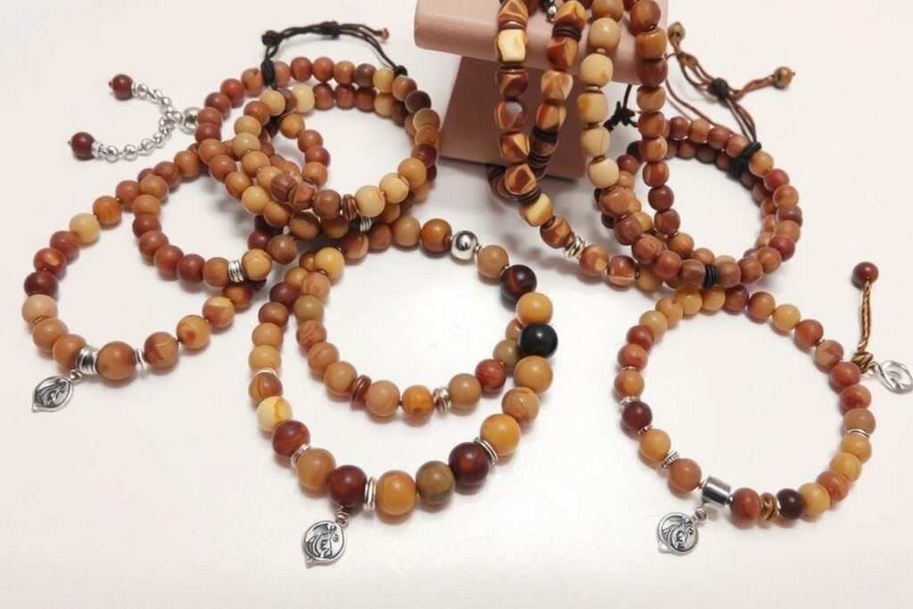 Handmade beaded bracelets with natural stones and charms